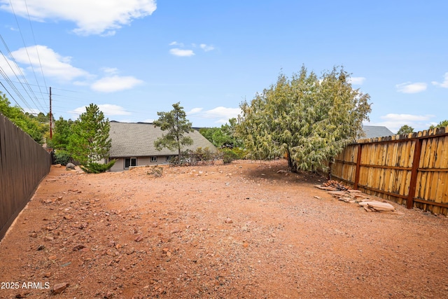 view of yard featuring fence