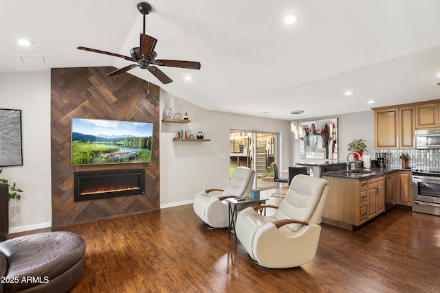 living room with dark wood-type flooring, a large fireplace, visible vents, and vaulted ceiling