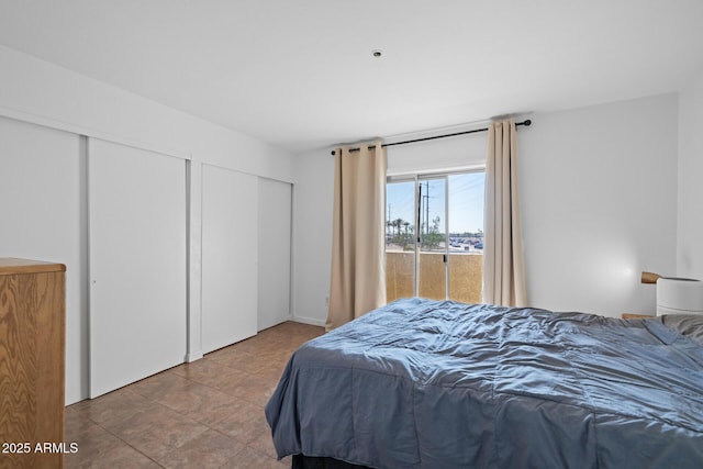 12123 W Bell Rd Unit 211, Surprise, AZ 85378 - bedroom featuring multiple closets