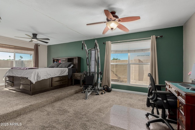 3061 W Betty Elyse Ln, Phoenix, AZ 85053 - carpeted bedroom with multiple windows and ceiling fan