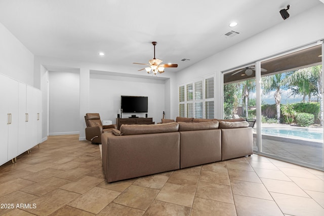 living area with recessed lighting, ceiling fan, and visible vents