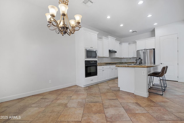 kitchen featuring visible vents, recessed lighting, white cabinetry, and stainless steel appliances