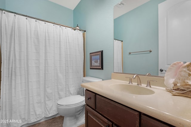 full bathroom featuring vanity, tile patterned flooring, toilet, and visible vents