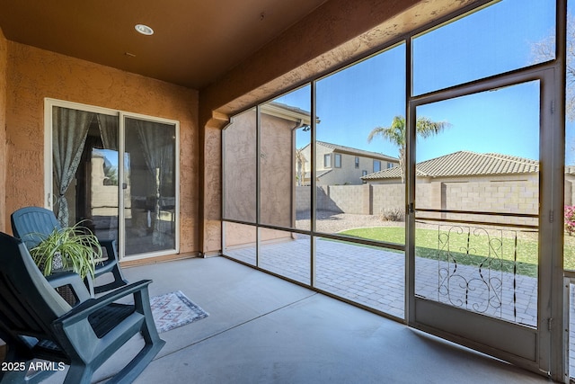 view of unfurnished sunroom