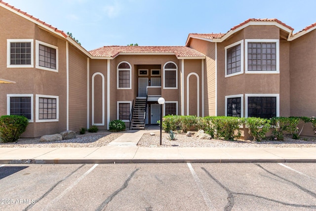 5230 E Brown Rd Unit 114, Mesa, AZ 85205 - multi unit property featuring stucco siding, a tiled roof, and stairway