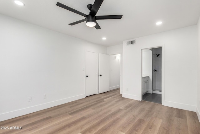 5230 E Brown Rd Unit 114, Mesa, AZ 85205 - unfurnished bedroom featuring recessed lighting, light wood-type flooring, ensuite bath, and a ceiling fan
