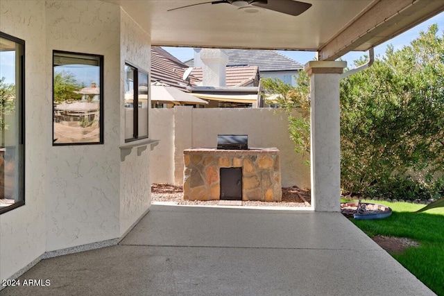 view of patio / terrace featuring ceiling fan