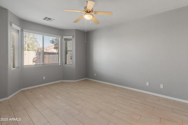 unfurnished room featuring ceiling fan