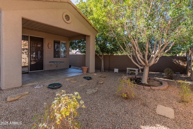 entrance to property with a patio area