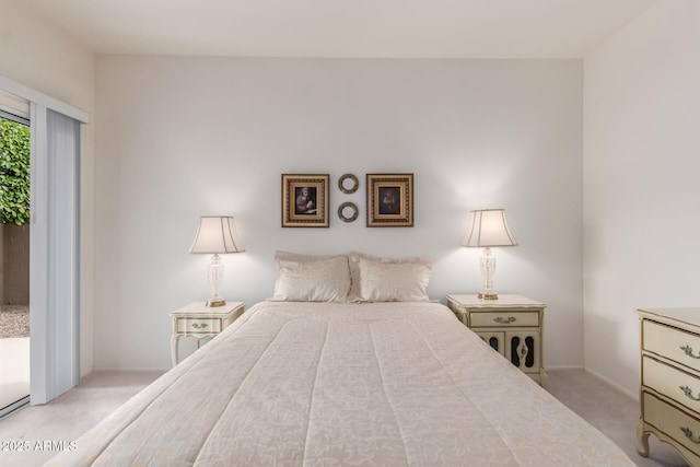 bedroom with access to exterior, light colored carpet, and baseboards