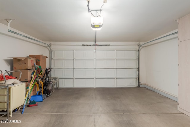 garage featuring a garage door opener