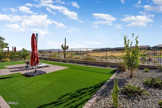 view of property's community featuring a patio