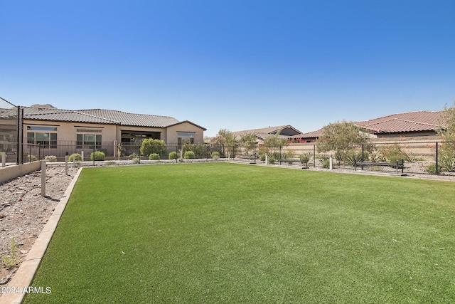 view of yard featuring fence