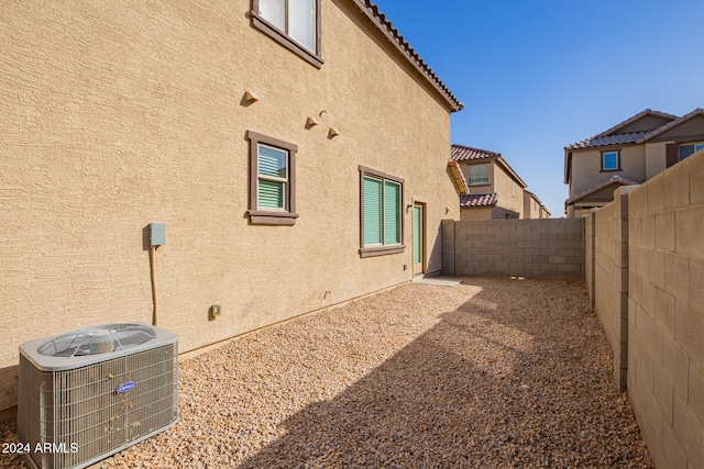 view of home's exterior with central air condition unit