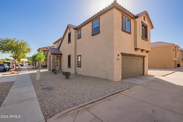 view of home's exterior with a garage