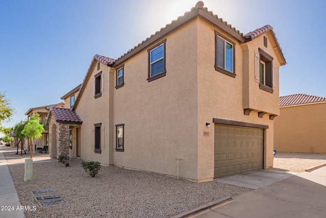 view of front of property featuring a garage