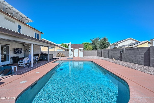 10806 W Adam Ave, Peoria, AZ 85373 - view of pool featuring a storage shed, a fenced backyard, and a patio