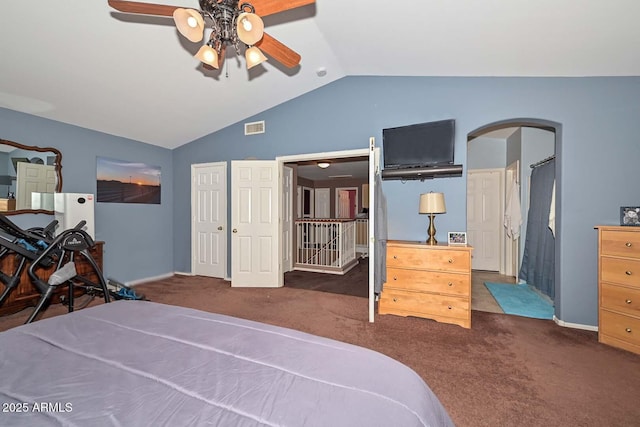 10806 W Adam Ave, Peoria, AZ 85373 - carpeted bedroom with lofted ceiling, arched walkways, and ceiling fan