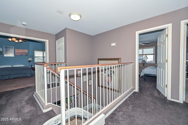 10806 W Adam Ave, Peoria, AZ 85373 - corridor featuring carpet and an upstairs landing