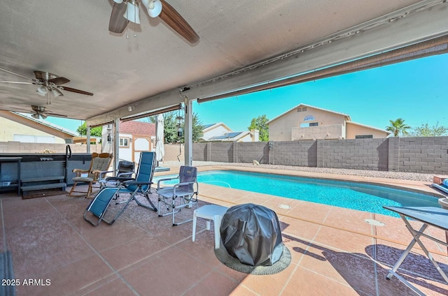 10806 W Adam Ave, Peoria, AZ 85373 - view of pool with a fenced backyard, ceiling fan, a patio area, and a storage shed