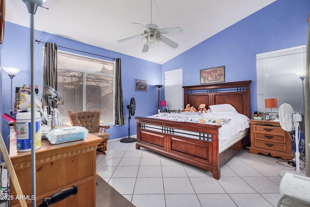 bedroom featuring lofted ceiling, light tile patterned flooring, and ceiling fan