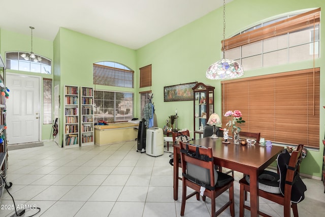 dining space featuring light tile patterned floors