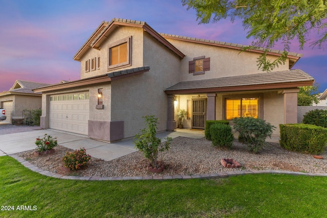 front of property featuring a garage