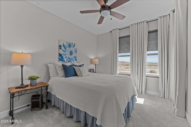 bedroom with vaulted ceiling, light carpet, and ceiling fan