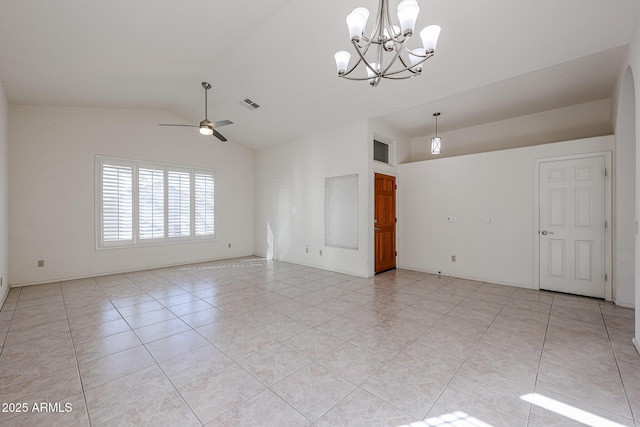 unfurnished room featuring ceiling fan with notable chandelier, vaulted ceiling, and light tile patterned floors