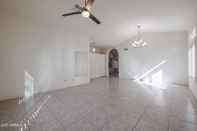 spare room with high vaulted ceiling, ceiling fan with notable chandelier, and light tile patterned floors