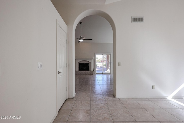 hallway featuring light tile patterned flooring