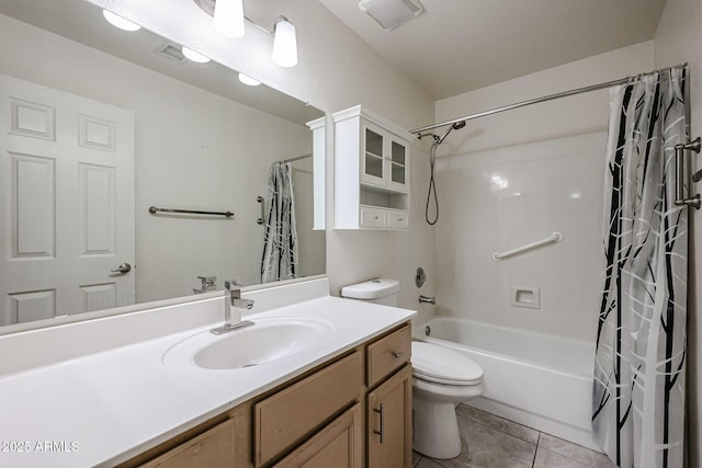 full bathroom featuring shower / bath combo, vanity, tile patterned floors, and toilet