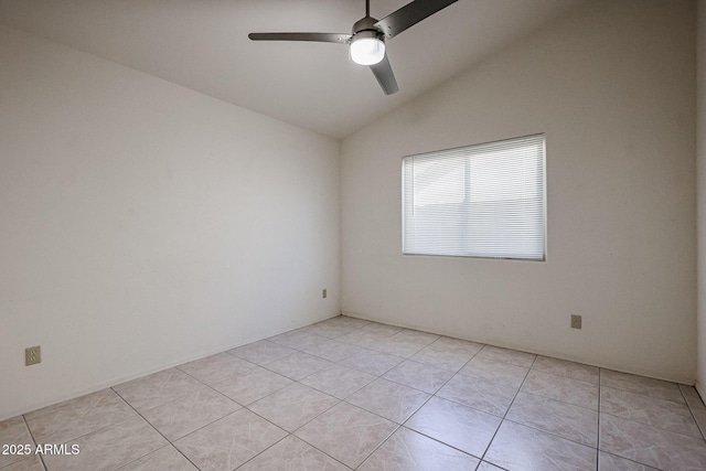 tiled spare room featuring lofted ceiling and ceiling fan