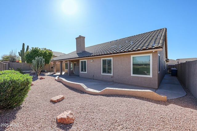 back of house featuring a patio area