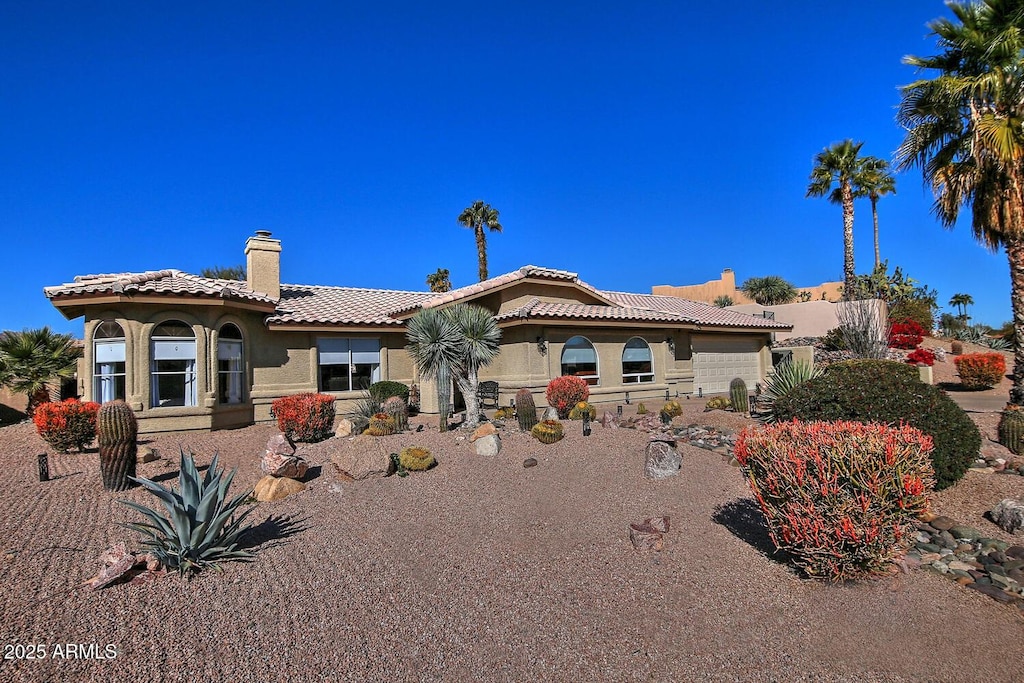 view of front of property featuring a garage