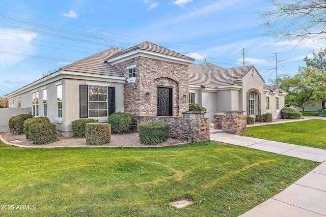 view of front of house with stone siding, a tile roof, a front lawn, and stucco siding