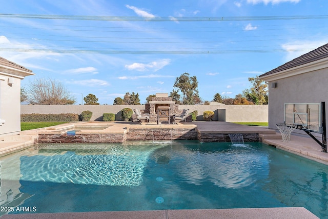 view of swimming pool featuring a fenced backyard, a pool with connected hot tub, a patio, and a glass covered fireplace