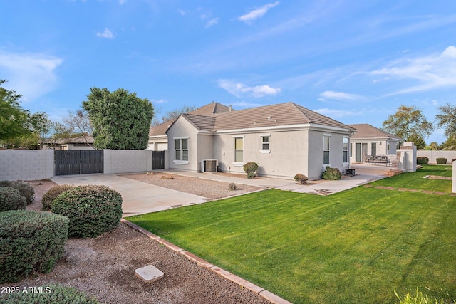 back of property with central AC unit, fence, a tiled roof, a gate, and stucco siding