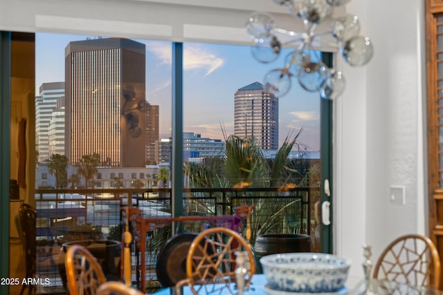 17 W Vernon Ave Unit 508, Phoenix, AZ 85003 - dining space featuring a city view and a chandelier