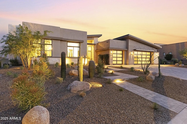 17245 E Desert Vista Trl, Rio Verde, AZ 85263 - modern home featuring driveway, stucco siding, and an attached garage