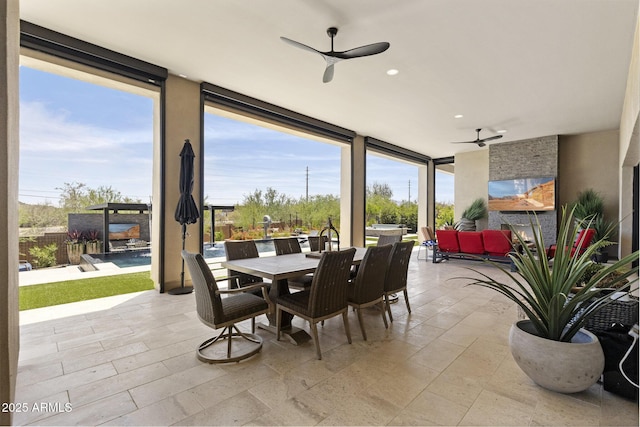 17245 E Desert Vista Trl, Rio Verde, AZ 85263 - view of patio / terrace with outdoor dining space, a ceiling fan, and an outdoor living space