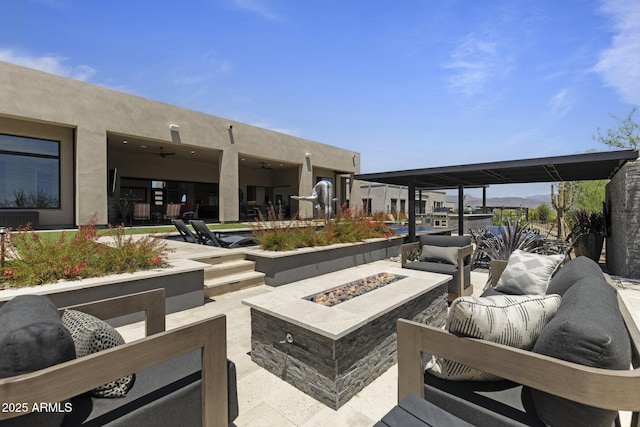 17245 E Desert Vista Trl, Rio Verde, AZ 85263 - view of patio with an outdoor living space with a fire pit