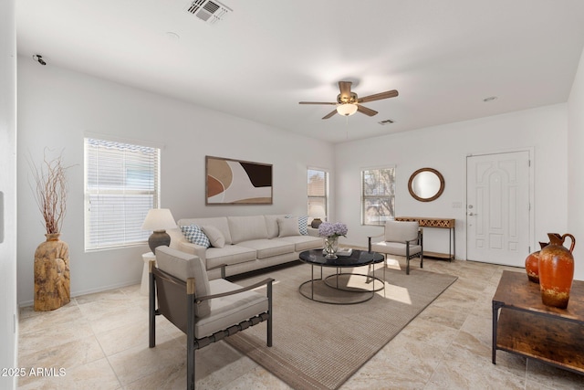 living room featuring ceiling fan