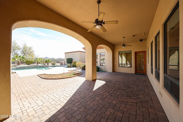 view of patio with ceiling fan