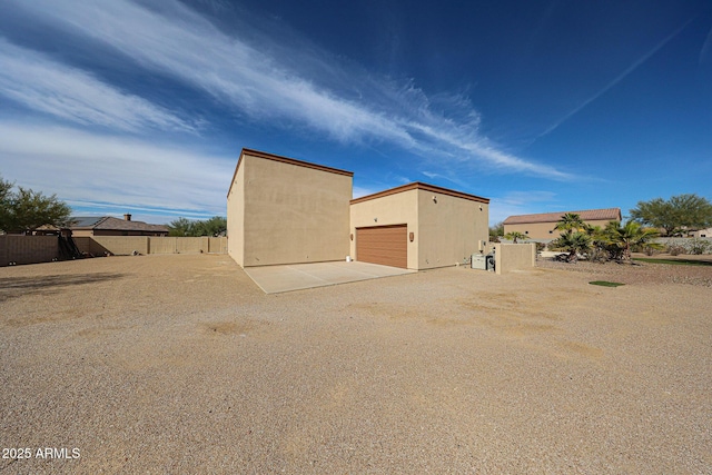 exterior space with a garage