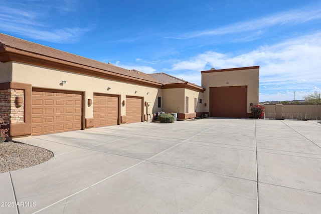 view of side of home with a garage