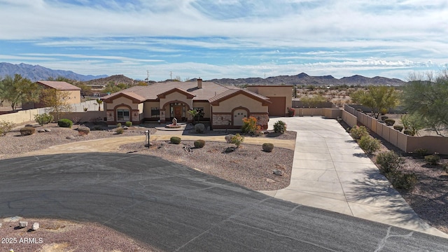 view of front of house with a mountain view