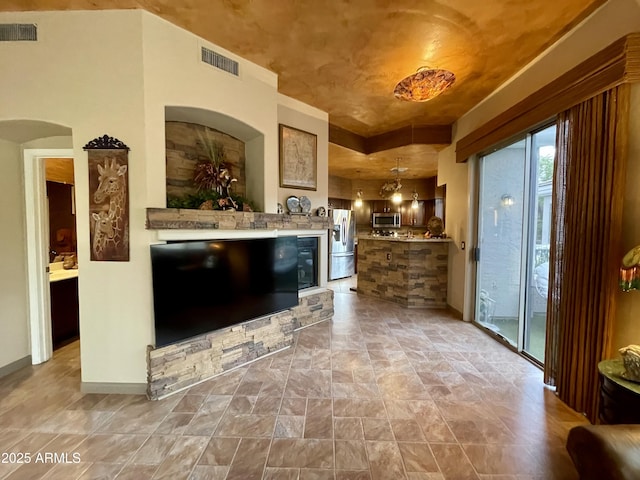 living area featuring wine cooler