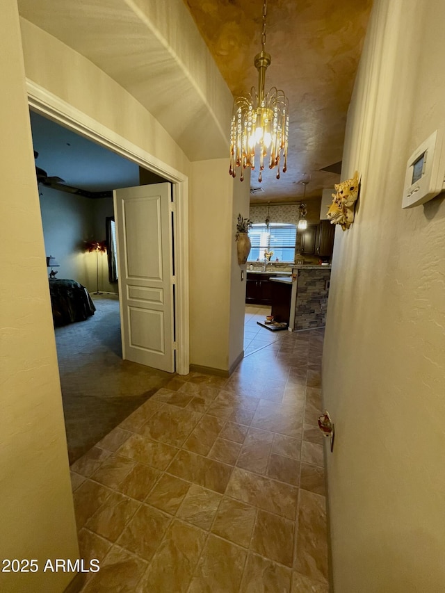 hall with a chandelier