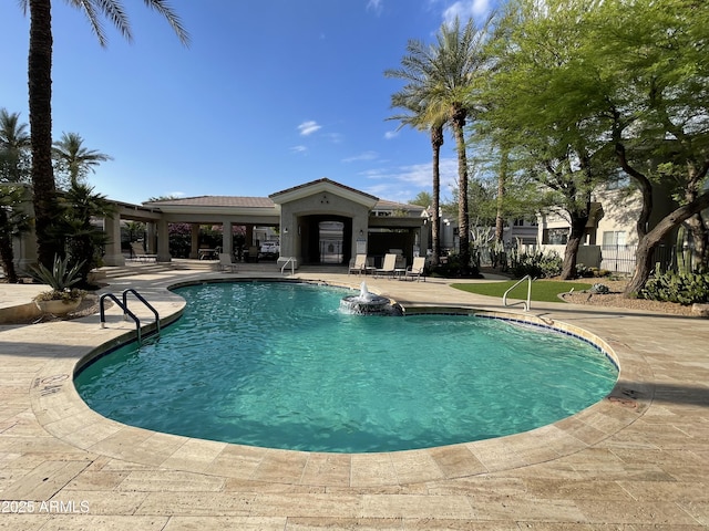 community pool featuring a patio